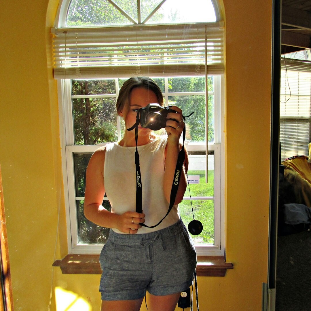 Young influencer recording a viral video story on her phone