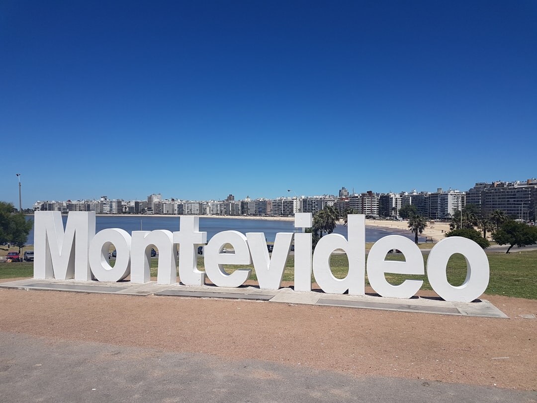 Modern newsroom office with journalists working at desks in Montevideo